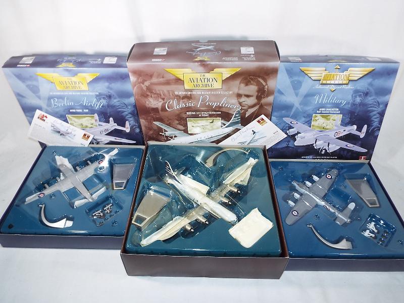 Three Corgi Aviation Archive die cast scale models comprising Boeing 377 Stratocruiser of BOAC,