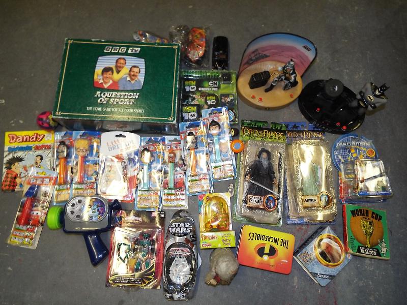 A good mixed lot to include Action Man sound and motion figure, Batman sound and motion figure,