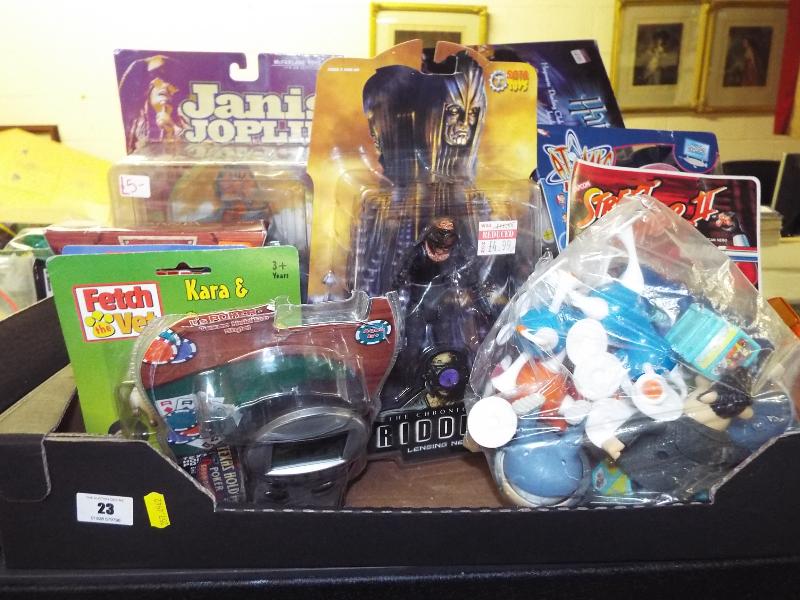 A collection of predominantly sealed blister packs and figures to include Texas Holdem Poker