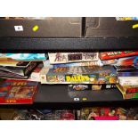 A full shelf containing a large quantity of board games
