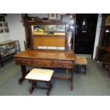 A contemporary mirror backed dressing table with a matching leather top stool,