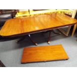 A good quality extending mahogany dining table,