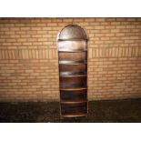A wooden book case / display case with an arch top 169cm (h) x 53cm (w) x 16cm (d)
