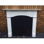 A fire surround with marble effect back 113 cm (h) x 137 cm (l) x 16 cm (w)