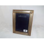 A hallmarked silver picture frame, Sheffield assay, 22.3cm x 17.