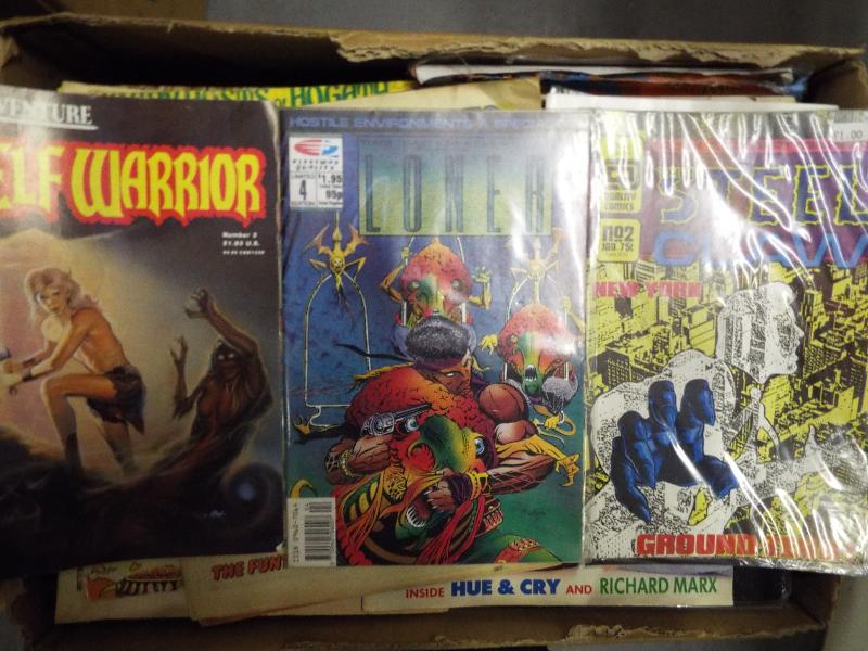A collection of unsorted comics, magazines,