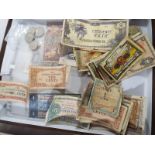 A collection of Worldwide bank notes and a small collection of coins