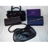A collection of five lady's handbags to