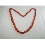 A bead necklace, approximately 90 cm