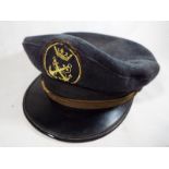 A mid 20th century seaman's peaked cap,