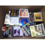 A large quantity of DVD's and music CD's