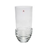 A Carlo Moretti clear glass vase with sprial ribs to the base with applied label. Height: 34cm /