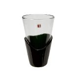A Carlo Moretti studio clear glass vase of tapering cylindrical vase with heavy black glass base,