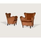 Pair upholstered armchairs c,1956 Pair of curvaceous upholstered armchairs on turned  beech legs,