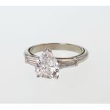 A Pear Shaped Brilliant Cut Diamond Ring. 2.08 carats. Colour E. Clarity SI1. Set in high carat