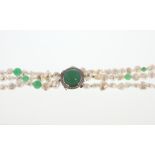 A Long Three Strand Freshwater Pearl, Jade and Diamond Set Bead Necklace. Each strand 420mm long.