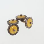 A Fine Pair of Diamond and Yellow Enamel Cufflinks. Set in high carat yellow and white metal.