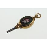 A Fine Yellow Gold and Steel Watch Key. 18th/19th century. Inset with a micro-mosiac of summer