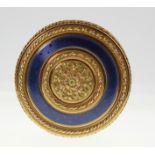 A French Gold and Blue Enamel Circular Box. 18th century. Decorated with a central foliate motif and
