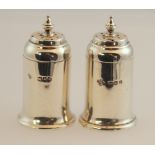 A Pair of Sterling Silver Pepperettes.