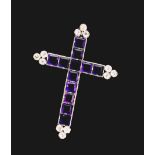 A Diamond and Amethyst Cross. Set in hig