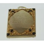 A William IV Gold and Black Enamel Memorial Locket. Circa 1831. Of rectangular form opening to