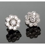 A Pair of Diamond Set Flower Head Posted