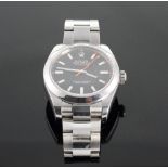 Rolex. A Gentlemans Stainless Steel Oyster Perpetual Milgauss. With a black 30 mm dial and orange