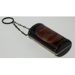 Cartier. An 18 Carat yellow Gold, Diamond and Ruby Set Black and Ox Blood Enamel Compact and