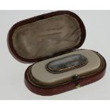 An Ivory Gold Mounted and Seed Pearl Set Lady's Needle Box. Late 18th century. Of rounded oblong