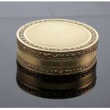 A French Two Colour Gold Circular Box. 18th century. With engine turned decoration wityhin husk