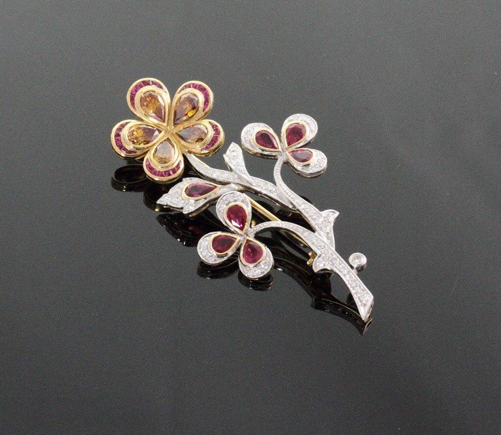 An Ornate Diamond Ruby and Cognac Coloured Diamond Set  Flower Brooch. Set in high carat yellow
