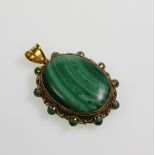 A Malachite Locket pendant. Set in high