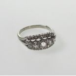 A Diamond Set Dress Ring. In high carat