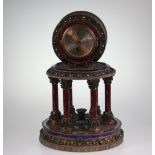 A 19th Century Filigree, Enamel and Coloured Stone Set Portico Timepiece. The 25 mm silvered dial