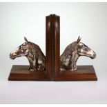 A Pair of Silver and Hardwood "Horses He