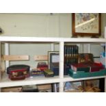 Firescreen, bookcase and books, wood bow