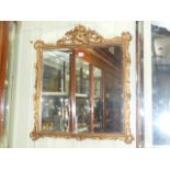 Gilt frame bevelled wall mirror with che