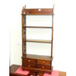 Mahogany four drawer open bookcase