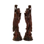 A large pair of Chinese carved hardwood