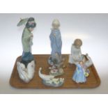 Two Lladro geese, swan, bird and figure,