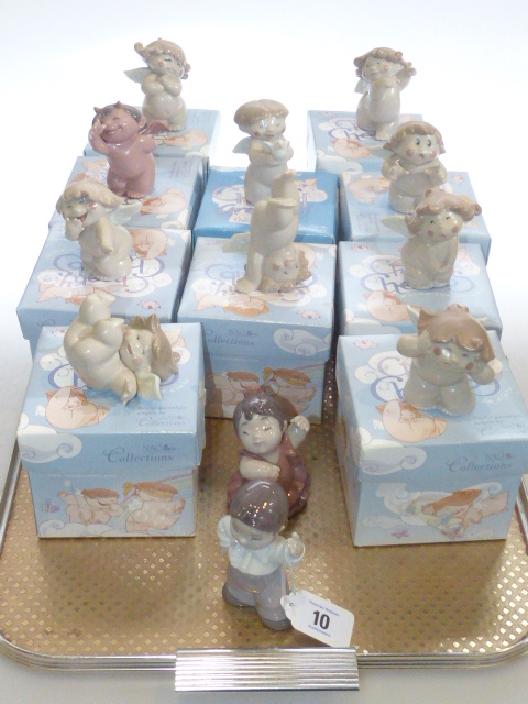 Twelve Nao cheeky cherubs playful porcelain angels (ten,