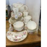 Thirty-two pieces of Royal Crown Derby 'Derby Posies' china including teapot, cups, saucers, plates,