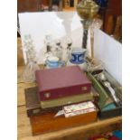 Cased and loose cutlery, converted oil lamp, pair of figures, pair of figure candlesticks,