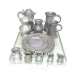 Four pewter plates and collection of pewter measures