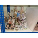 Pair of bisque figures and collection of various figurines