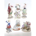 Five Continental porcelain figures and pottery dog