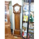 Oak cased eight day longcase clock, 12 inch circular silvered dial signed Waring & Gillow Ltd,