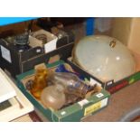 Three boxes of oil lamps and light fittings