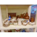 Set of four graduated Guernsey milk jugs, pair brass candlesticks, miniature mahogany chest,